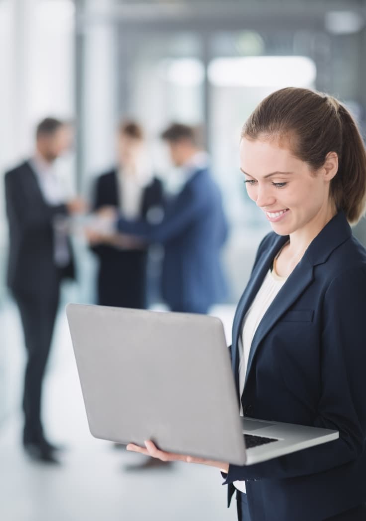 Leading Microsoft consultant looking at laptop screen